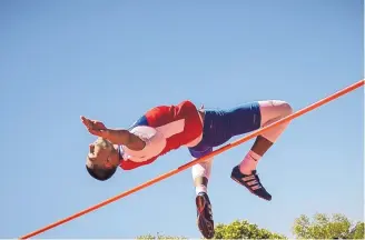  ?? ROBERTO E. ROSALES/JOURNAL ?? West Mesa’s Dominic Fisher clears the bar easily to win the boys high jump Friday at the Richard A. Harper Memorial track meet held at Albuquerqu­e Academy.