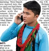  ??  ?? CONTACT: Shamsher speaks to his father on a mobile in the Jungle