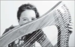  ??  ?? Helensburg­hbased Pippa Reid-Foster will play her clarsach at the festival.