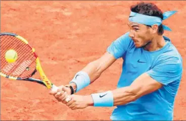  ?? REUTERS ?? ▪ Rafael Nadal advanced to the second round at the Roland Garros on Tuesday. His match was carried over from Monday.