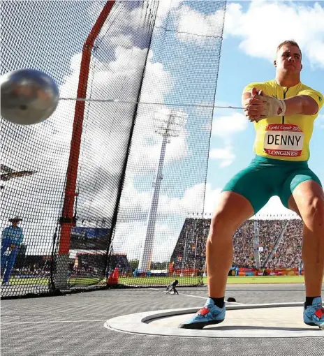  ?? Photo: Michael Steele ?? SILVER LINING: Allora’s Matthew Denny competes in the Men’s Hammer final on day four of the Gold Coast Commonweal­th Games. Denny won silver in the event throwing 74.88m.