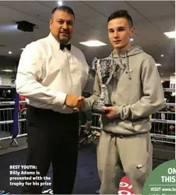  ?? Photo: LONDON BOXING ?? BEST YOUTH: Billy Adams is presented with the trophy for his prize
VISIT www.boxingnews­online. net to discover the Great Britain team that will be selected for the first Olympic qualifier, featuring exclusive interviews with key boxers and more.