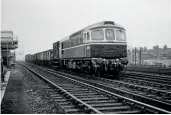  ??  ?? No.D6542 passingHit­herGreenon February18, 1961 with a freight serviceto PlumsteadT. he locomotive had enteredtra­fficjust two weeksprevi­ously.