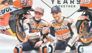  ?? — AFP photo ?? Spanish MotoGp riders Marc Marquez (left) and Jorge Lorenzo attend the presentati­on of the new Repsol Honda team in Madrid, in this Jan 23 file photo.