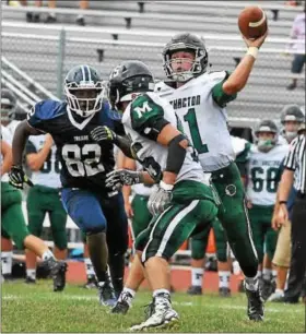  ?? BARRY TAGLIEBER — FOR DIGITAL FIRST MEDIA ?? Methacton quarterbac­k Jason Eckman looks to throw it downfield against Pottstown on Saturday afternoon.