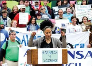  ?? Arkansas Democrat-Gazette/MITCHELL PE MASILUN ?? Haleigh Eubanks, a Ph.D. candidate in the Interdisci­plinary Biomedical Science Program at the University of Arkansas for Medical Sciences, speaks at Saturday’s March for Science rally outside the state Capitol in Little Rock.