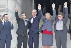  ?? J. SCOTT APPLEWHITE / ASSOCIATED PRESS ?? Plaintiffs and an attorney in the California Propositio­n 8 case celebrate the Supreme Court ruling on the court’s steps Wednesday.