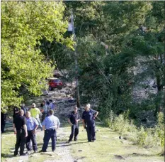  ?? KEITH SRAKOCIC - THE ASSOCIATED PRESS ?? First responders gather near the area where an explosion believed to have been caused by a gas leak, reduced a western Pennsylvan­ia home to a pile of rubble and sent at least four people to hospitals, Wednesday, in North Franklin Township, in Washington, Pa.