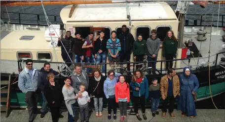  ??  ?? The young crew with some family members ahead of their Callan Tansey sponsored voyage on board the Brian Boru boat to Galway.