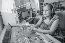  ??  ?? MARCH 3, 2015
Kitty Emataluk on air at Kangirsuk’s radio station. The radio plays a key role in this northern village, from giving the weather forecast to sending out messages such as “Alec wants to reach Kayla.”