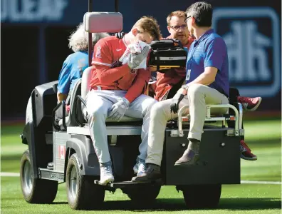  ?? GETTY FILE ?? Angels outfielder Taylor Ward suffered season-ending injuries to his face after being hit by a 92 mph pitch during a game in July.