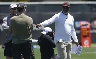  ?? JEFF CHIU — THE ASSOCIATED PRESS ?? Former 49ers player Anthony Lynn, right, is the club's new assistant head coach and running backs coach. He brings a wealth of NFL experience, including serving as head coach of the Los Angeles Chargers from 2017-20.