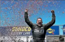  ?? BENMARGOT - THE ASSOCIATED PRESS ?? Tony Stewart celebrates after winning the NASCAR Sprint Cup Series auto race Sunday, June 26, 2016, in Sonoma, Calif.