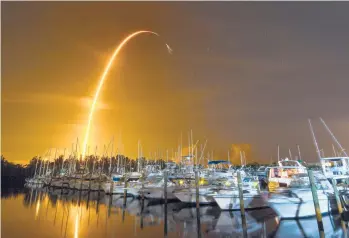  ?? MALCOLM DENEMARK/FLORIDA TODAY ?? Spacex launch: A Spacex Falcon 9 rocket blasts off Sunday on a resupply mission for NASA to the Internatio­nal Space Station from Pad 39A at Kennedy Space Center, seen from Merritt Island, Florida. The delivery of ants, avocados and a human-size robotic arm is the company’s 23rd for NASA in just under a decade.