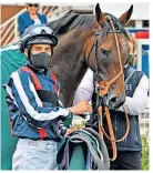  ??  ?? Top team: Jockey Sean Levey with Happy Romance after their Super Sprint victory