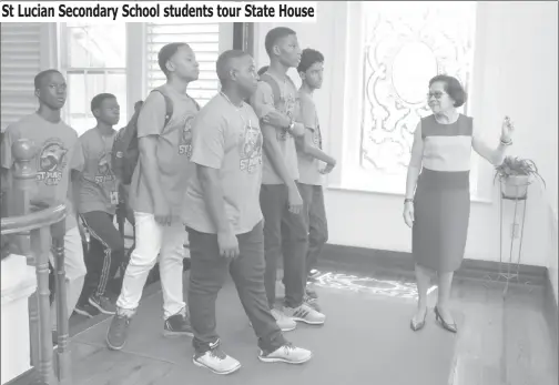  ??  ?? Students and teachers from the Saint Mary’s College, a top performing all-male Catholic Secondary School in Saint Lucia, were yesterday given a guided tour of State House by First Lady, Sandra Granger. The students are currently in Guyana on an...
