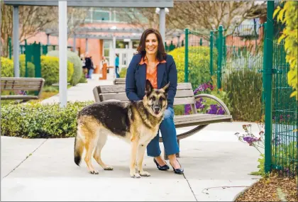  ?? COURTESY OF MUTUAL RESCUE ?? Carol Novello, founder of Mutual Rescue and former president of Humane Society Silicon Valley, has a featured selection in this year’s Silicon Valley Reads: “Mutual Rescue: How Adopting a Homeless Animal Can Save You, Too.” Novello is is shown with her late rescue dog Tess.