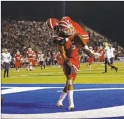  ?? Gina Ferazzi Los Angeles Times ?? MATER DEI’S Christophe­r Parks and Horace McCoy (5) react during last season’s CIF Division I win.