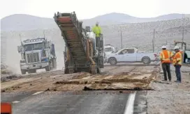  ?? AP PHOTO/MARCIO JOSE SANCHEZ ?? Crews work Sunday on repairing a section of Highway 178 in the aftermath of an earthquake near Trona, Calif.