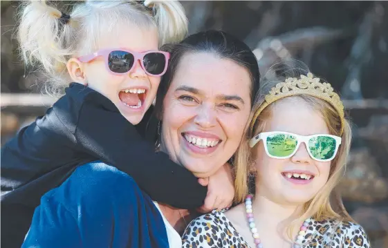  ?? Picture: GLENN HAMPSON ?? Kristy Rigby, with daughters Maxie, 3, and Ella, 7, has been nominated for the AusMumpren­eur Awards.