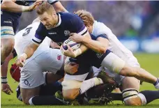  ??  ?? Tough to stop: Scotland’s John Barclay