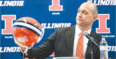  ?? | AP ?? Josh Whitman (above) fired football coach Bill Cubit three months after Illinois had given Cubit a two-year contract.