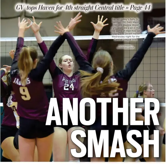  ?? PETE BANNAN — MEDIANEWS GROUP ?? Garnet Valley’s Kelly St. Germain (9), Sam Mann
(24) and Maddie Wood
(12) celebrate a kill in the first game of their five-set victory over Strath Haven Wednesday night for the Central League title.