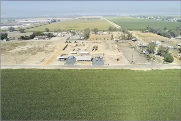  ?? Brian van der Brug Los Angeles Times ?? ABOUT 5.5 MILLION of California’s nearly 40 million residents live in rural counties, which make up nearly half the state’s land mass. Many of them who rely on groundwate­r wells are waterless. Above, a Visalia farm.
