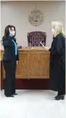  ?? (Special to The Commercial) ?? Sara Lunsford wife of the late White Hall City Council Member Andrew Lunsford, is sworn in Friday by Jefferson County District Judge Kim Bridgforth.