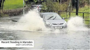  ??  ?? Recent flooding in Marsden
ANDY CATCHPOOL