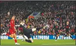  ?? (File Photo/AP/Jon Super) ?? Atletico Madrid’s Kieran Trippier attempts a shot at goal in front of Liverpool’s Trent Alexander-Arnold on March 11, 2020, during a second leg, round of 16, Champions League soccer match between Liverpool and Atletico Madrid at a packed Anfield stadium in Liverpool, England.