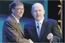  ?? KIICHIRO SATO, AP ?? Microsoft founder Bill Gates, left, shakes hands with Nelson Smith, who at the time was president and CEO of the National Alliance for Public Charter Schools, during the 2010 National Charter Schools Conference in Chicago.