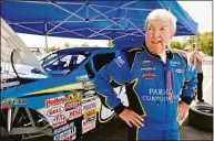  ?? Ross William Hamilton / Associated Press ?? Hershel McGriff stands next to his car at Portland Internatio­nal Raceway in 2009.