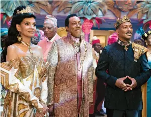  ??  ?? Shari Headley, Arsenio Hall, and Eddie Murphy.