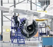  ?? REUTERS FILE PHOTO ?? An employee works on an Airbus A220-300 at the Airbus facility in Mirabel, Que., on Feb. 20, 2020.