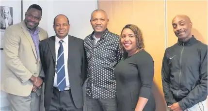  ?? Edge Hill University ?? Tonika Stephenson with Martin Forde QC (second left), who wrote the Compensati­on Scheme for the Home Office and Anthony Brown (centre), a Windrush victim and chair of the Manchester Windrush Team