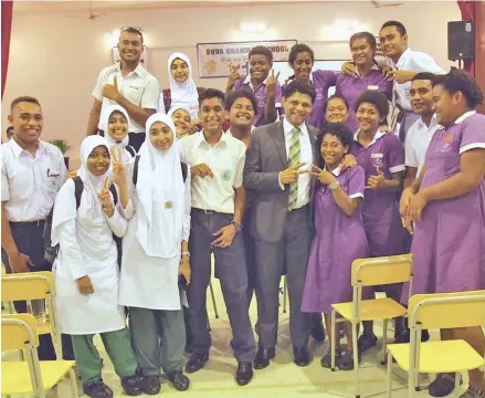  ?? Photo: DEPTFO News ?? Attorney-General Aiyaz Sayed-Khaiyum with students from Suva schools after a consultati­on held at Suva Grammar School on Thursday, March 22, 2018.