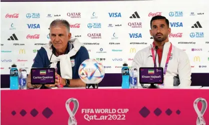  ?? ?? Iran manager Carlos Queiroz (left) and captain Ehsan Hajsafi. Photograph: Peter Byrne/PA