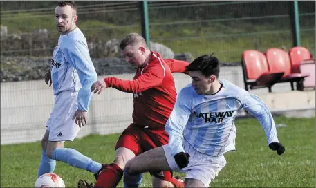  ??  ?? Cian Higgins of Aughanagh Celtic in action with Simon Gilmartin, Ballisodar­e United. Pic: Carl Brennan.