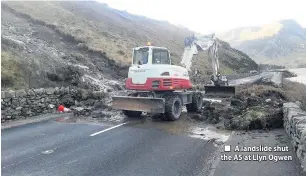  ??  ?? ■ A landslide shut the A5 at Llyn Ogwen