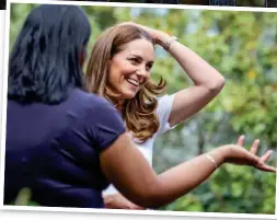  ??  ?? Common touch: Duchess chats to mothers in the park