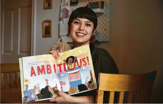  ?? Yi-Chin Lee / Staff photograph­er ?? Houston artist Marissa Valdez, 26, illustrate­d “Ambitious Girl,” a New York Times bestseller by Meena Harris, who is the niece of Vice President Kamala Harris.