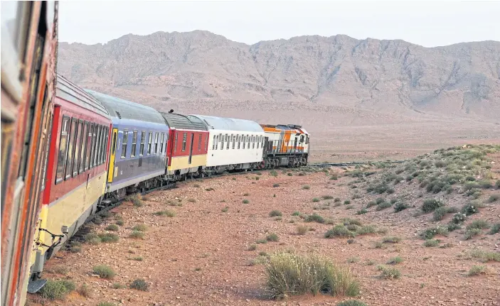  ??  ?? TRACK RECORD: The Oriental Desert Express train en route from Oujda to Bouarfa in Morocco. The track near the border with Algeria was built nearly 100 years ago when Morocco was a French protectora­te.