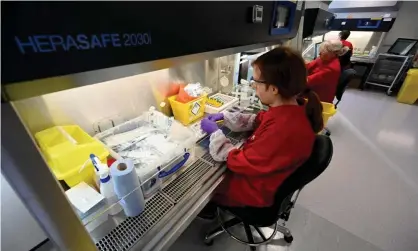  ?? Photograph: Paul Ellis/AFP via Getty Images ?? ‘What’s abundantly clear is that centrally directed programmes that overlook local expertise are unlikely to succeed.’ Scientists test coronaviru­s samples at the Lighthouse Lab in Cheshire.