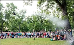  ?? Photo submitted Photo submitted ?? Campers watch as their two-liter bottle rockets are launched during the rocket competitio­n.