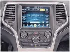  ??  ?? A greater number of controls for things like climate, communicat­ion, navigation and radio adjustment­s are being crammed into busy touchscree­ns.