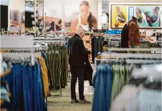  ?? Seth Wenig/associated Press ?? Clothing prices rose 0.6% last month after three months of declines, the Labor Department says. The overall jump in prices of 0.4% from January to February is above the previous month’s 0.3%.