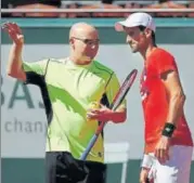  ?? AFP ?? Novak Djokovic (right) and coach Andre Agassi during a training session ahead of the Roland Garros, in Paris on Friday.