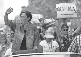  ??  ?? Democratic presidenti­al candidate U.S. Sen. Kamala Harris, D-calif., rides in the SF Pride Parade Sunday in San Francisco. JUSTIN SULLIVAN/GETTY IMAGES