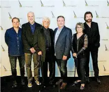  ?? [PHOTO BY BEV MOSER] ?? Posing for a photo are, from left, Nashville Songwriter­s Hall of Fame 2018 inductees Wayne Kirkpatric­k, Byron Hill and Joe Melson; Nashville Songwriter­s Hall of Fame Executive Director Mark Ford; inductees K.T. Oslin and Ronnie Dunn.